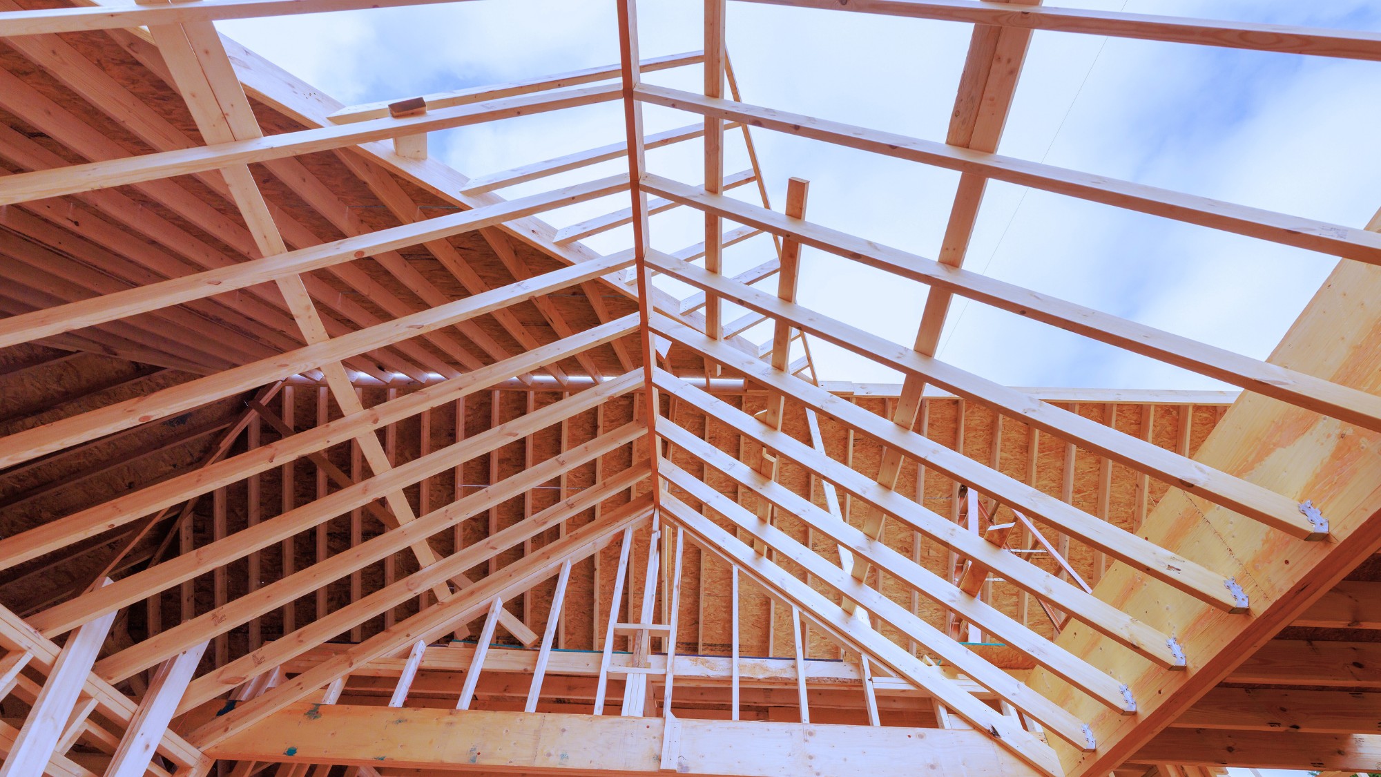 The interior of a home in the middle of construction with only the frame built.